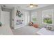 Bright bedroom featuring neutral paint, decor, and two windows with a picturesque view at 9671 Ridgecrest Ln, McCordsville, IN 46055