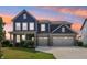 Captivating two-story home with an attached two-car garage showcasing a blend of modern elegance at 9671 Ridgecrest Ln, McCordsville, IN 46055