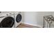 A well-equipped laundry room features Samsung washer and dryer units and ample space at 9671 Ridgecrest Ln, McCordsville, IN 46055