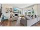 Spacious living room with ample natural light, fireplace, and open layout at 9671 Ridgecrest Ln, McCordsville, IN 46055