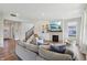 Bright living room features a fireplace, built-in shelves, and comfortable seating at 9671 Ridgecrest Ln, McCordsville, IN 46055