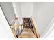 Basement stairs lead to extra storage space, useful for any homeowner at 1000 Leisure Ln, Greenwood, IN 46142