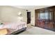 Neutral bedroom featuring carpet floors, a closet, and a comfy-looking bed at 1000 Leisure Ln, Greenwood, IN 46142