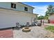 A cozy fire pit area in the backyard, perfect for outdoor gatherings and enjoying evenings under the stars at 1000 Leisure Ln, Greenwood, IN 46142
