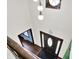 Foyer featuring hardwood flooring, chandelier lighting, and a wooden front door at 1000 Leisure Ln, Greenwood, IN 46142