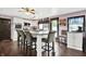 Spacious kitchen with large island, granite countertops, and stainless-steel appliances and chairs at 1000 Leisure Ln, Greenwood, IN 46142