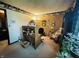 Cozy home office featuring a built-in desk, warm lighting, and charming decor, perfect for remote work at 1008 Whispering Trl, Greenfield, IN 46140