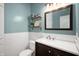 Stylish powder room with shiplap, floating shelves, and a dark wood vanity at 1031 Lancashire Ln, Pendleton, IN 46064