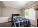 Cozy bedroom with carpet, window, and bed with stylish headboard at 1031 Lancashire Ln, Pendleton, IN 46064