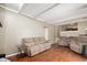 Spacious living room with hardwood floors, neutral paint, and a view into the kitchen at 1031 Lancashire Ln, Pendleton, IN 46064