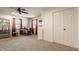 Bedroom with neutral carpet, ceiling fan, and bright windows, creating a welcoming and relaxing atmosphere at 1112 Halifax Ct, Indianapolis, IN 46231