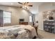Bedroom featuring neutral paint, ceiling fan, and cozy bed for a comfortable and stylish retreat at 1112 Halifax Ct, Indianapolis, IN 46231