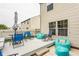Enjoy the outdoors on this charming deck, complete with an umbrella table, chairs and beanbag seating at 1112 Halifax Ct, Indianapolis, IN 46231
