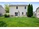 Spacious backyard with a patio area, perfect for outdoor gatherings and relaxation at 11138 Bear Hollow Dr, Indianapolis, IN 46229