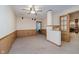 Finished basement with carpet and paneling, showcasing versatile space at 11354 Royal Pl, Carmel, IN 46032