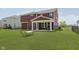 Well-manicured backyard with a hammock and partial fence at 11840 Crossbill Ct, Noblesville, IN 46060