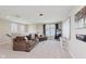 Bonus room with carpet, couches, and movie night decor for entertaining or relaxation at 11840 Crossbill Ct, Noblesville, IN 46060