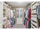 Spacious walk-in closet with custom shelving and ample storage, providing an organized space at 12259 Sweet Creek Trl, Fishers, IN 46037