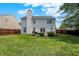A beautiful backyard, perfect for entertaining with a patio, grill and green space at 12322 Cool Winds W Way, Fishers, IN 46037