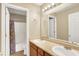 Bathroom features double sinks, cabinets, a vanity, and a shower and tub combo with floral shower curtain at 12322 Cool Winds W Way, Fishers, IN 46037