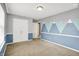 Bedroom with two-tone walls, carpeted floor and closet with double doors at 12322 Cool Winds W Way, Fishers, IN 46037