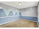 Charming bedroom with two-tone walls and carpeted floor at 12322 Cool Winds W Way, Fishers, IN 46037