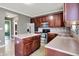 Well-lit kitchen featuring a center island, stainless appliances, and tiled backsplash at 12322 Cool Winds W Way, Fishers, IN 46037