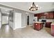 Open floor plan with living room flowing into the kitchen at 12322 Cool Winds W Way, Fishers, IN 46037