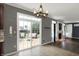 Sliding glass doors lead to an outdoor patio with furniture at 12322 Cool Winds W Way, Fishers, IN 46037