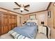 Cozy bedroom with a ceiling fan, ensuite nightstands, and closet at 1345 Westwind Dr, Avon, IN 46123