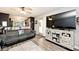 Cozy living room with modern entertainment center, comfortable seating, and stylish decor at 1345 Westwind Dr, Avon, IN 46123
