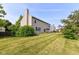 Expansive backyard with lush green lawn and mature landscaping, perfect for outdoor activities at 14109 Secretariat Ct, Carmel, IN 46074