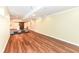 Spacious basement featuring wood-style floors and stylish seating area at 14109 Secretariat Ct, Carmel, IN 46074