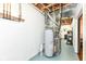 Basement utility area with water heater and HVAC system on painted concrete floor at 14109 Secretariat Ct, Carmel, IN 46074