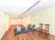 Spacious basement featuring wood-style floors and multiple seating areas at 14109 Secretariat Ct, Carmel, IN 46074
