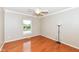 Minimalist bedroom with hardwood floors and a simple, clean aesthetic at 14109 Secretariat Ct, Carmel, IN 46074