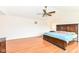 Large main bedroom featuring a vaulted ceiling and hardwood flooring at 14109 Secretariat Ct, Carmel, IN 46074