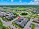 Aerial view of the home, located in a well-planned neighborhood with mature trees at 14234 Community Dr, Carmel, IN 46033