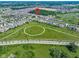 Aerial view showcasing the neighborhood's layout, with green spaces and walking paths at 14234 Community Dr, Carmel, IN 46033