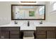 Modern bathroom with double sink vanity and large mirror at 14234 Community Dr, Carmel, IN 46033