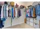 Walk in closet with storage racks and clothing at 14234 Community Dr, Carmel, IN 46033
