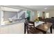 Dining area adjacent to yard; the open floor plan creates an inviting space for dining and entertaining with easy access outdoors at 14234 Community Dr, Carmel, IN 46033