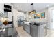Spacious kitchen with white cabinets, stainless steel appliances, and an island with a sink and dishwasher at 14234 Community Dr, Carmel, IN 46033