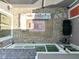 Overhead shot of the outdoor patio space complete with modern seating and pea gravel at 14234 Community Dr, Carmel, IN 46033