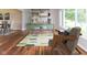 Bright home office space featuring modern decor, ample natural light, and stylish flooring at 14492 Cotswold Ln, Carmel, IN 46033