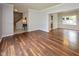 Open-concept living room with hardwood floors, ample space, and natural light, perfect for entertaining at 14492 Cotswold Ln, Carmel, IN 46033
