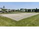 Well-maintained basketball court next to a playground and picnic shelter on a sunny day at 15178 Silver Charm Dr, Noblesville, IN 46060