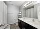 Spacious bathroom with dual sinks, a large mirror, and a shower/tub combination, perfect for a Gathering at 15178 Silver Charm Dr, Noblesville, IN 46060