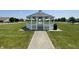 Picturesque gazebo on a sunny day, providing a serene spot for relaxation and enjoyment in the community at 15178 Silver Charm Dr, Noblesville, IN 46060