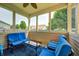 Cozy screened porch furnished with comfortable seating, offering a relaxing and private outdoor space at 15178 Silver Charm Dr, Noblesville, IN 46060